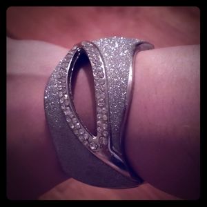 Silver cuff bracelet.